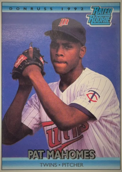 Front of 1992 Donruss Baseball Cards Patrick Lavon Mahomes #403, upright portrait baseball card front. A color photograph shows a Minnesota Twins pitcher in a white pinstriped uniform and cap holding a glove…