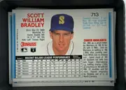 Back of 1992 Donruss Baseball Cards Scott Bradley #713, landscape-oriented baseball card back. The large red player name is at upper left, card number 713 at upper right, and a centered portrait occupies…
