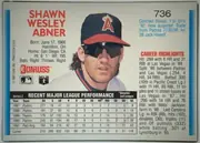 Back of 1992 Donruss Baseball Cards Shawn Abner #736, landscape-oriented baseball card back. The upper-left area has the player name in large red type, with biographical details beneath. A large…