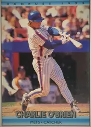 Front of 1992 Donruss Baseball Charlie O'Brien #777 Base, portrait baseball card front. A full-bleed action photograph shows a Mets player batting in a pinstriped uniform. The printed brand and year appear…