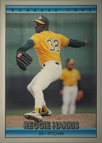 Front of 1992 Donruss Baseball REGINALD ALLEN HARRIS #781, portrait-oriented baseball card front. A right-handed pitcher in an Oakland A's yellow home uniform (gray number 32 on the back, white pants, gray…