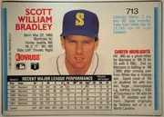 Back of 1992 Donruss Baseball Scott Bradley #713 Base, upright landscape-oriented Donruss baseball card back. The player's name appears in large red type at upper left, with biographical text below. A…