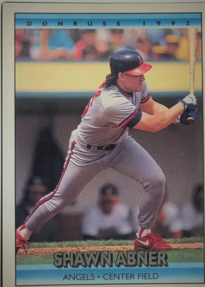 Front of 1992 Donruss Baseball Shawn Wesley Abner #736 Base (back reads "© 1991 LEAF, INC." with period), upright portrait baseball card. A player in an Angels uniform is shown batting in a stadium. The top blue band reads "DONRUSS 1992"; the large…