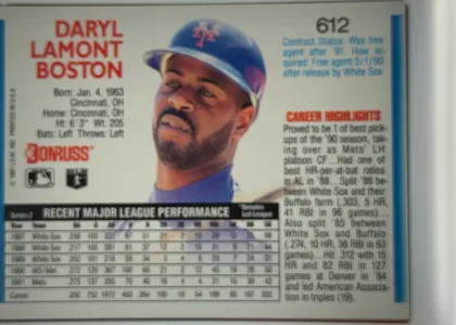 Back of 1992 Donruss Daryl Boston #612, landscape-oriented baseball card back. The upper-left area shows the red player name 'DARYL LAMONT BOSTON' above biographical details. A large…