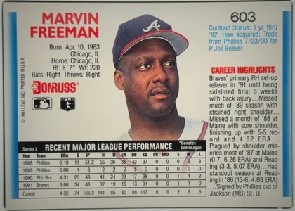 Back of 1992 Donruss Marvin Freeman #603, upright landscape-oriented baseball card back. The player name MARVIN FREEMAN appears in large red uppercase type at upper left, with biographical…