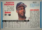 Back of 1992 Donruss Marvin Freeman #603, landscape-oriented baseball card back. Marvin Freeman's name appears in large red type at upper left, with biographical information beneath it. A…