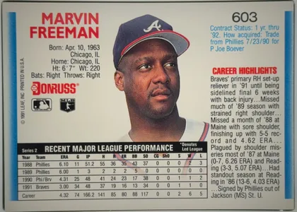 Back of 1992 Donruss Marvin Freeman #603, landscape-oriented baseball card back. Marvin Freeman's name appears in large red type at upper left, with biographical information beneath it. A…
