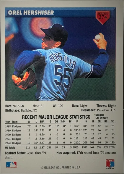 Back of 1992 Donruss Orel Hershiser #247 1992 Donruss #247 (base, Series One), upright landscape-oriented player card back. A blue header at the top prominently reads OREL HERSHISER, with a red shield-shaped Series 1 marker and…
