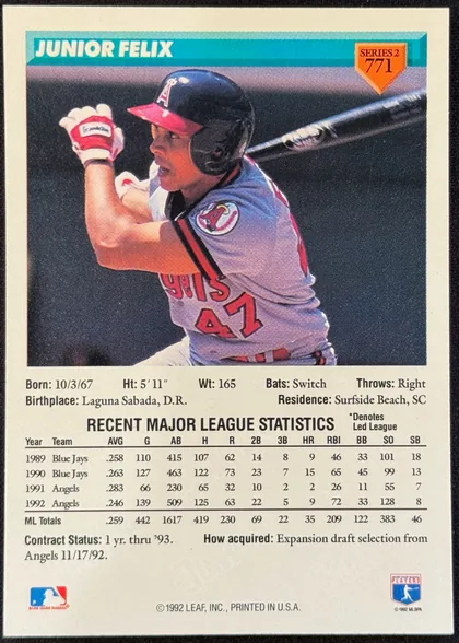 Back of 1993 Donruss Baseball JUNIOR FELIX #771 Base (Series 2), upright portrait-oriented baseball card back. A turquoise header at the top contains the large white title "JUNIOR FELIX"; an orange shield in the…