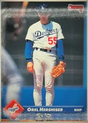 Front of 1993 Donruss Baseball Orel Hershiser #274 Base, portrait baseball card front showing a full-body Los Angeles Dodgers player in a white uniform with blue sleeves and number 55. The Donruss logo is…