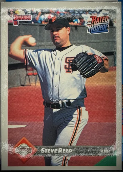 Front of 1993 Donruss Baseball Steve Reed #375 Base (Rated Rookies subset), portrait-oriented baseball card front. The Donruss logo and the number 93 are at the upper left, while a large Rated Rookie graphic is at the upper…