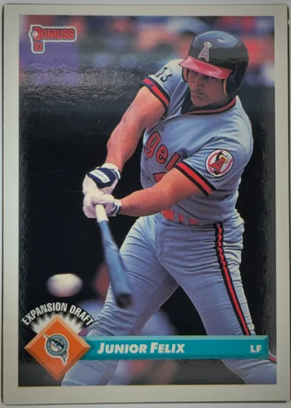 Front of 1993 Donruss JUNIOR FELIX #771 Base, upright portrait-format baseball card front. The upper-left corner has the red-and-white DONRUSS logo with 93 beneath it. A baseball player in a…