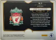 Back of 2024-25 Panini Select Premier League Soccer Andy Robertson #9 Prizm, landscape-oriented player card back. A large Liverpool Football Club crest occupies the left half. On the right, the upper area shows "No. 9" and…