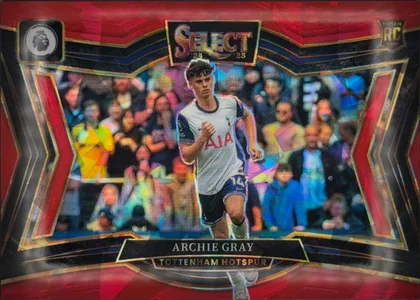 Front of 2024-25 Panini Select Premier League Soccer Archie Gray #236 Field Level Prizm, front of an upright portrait soccer card. A central action photograph shows Archie Gray in a white Tottenham Hotspur kit running in front of a…