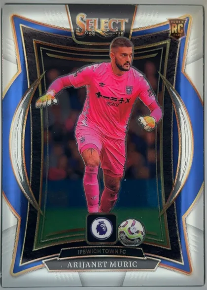 Front of 2024-25 Panini Select Premier League Soccer Arijanet Muric #18 Rookie RC Card, upright portrait soccer card front. The SELECT logo is centered at the top with 24 and 25 beneath it, and a ROOKIE RC CARD badge is at the upper…
