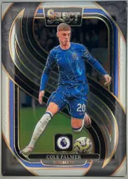 Front of 2024-25 Panini Select Premier League Soccer Cole Palmer #182 Mezzanine, portrait-oriented soccer card front. A stylized full-body image of Cole Palmer in a blue Chelsea FC kit occupies the center over a dark stadium and…