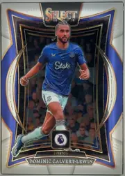 Front of 2024-25 Panini Select Premier League Soccer Dominic Calvert-Lewin #59 Base Terrace, portrait soccer card front. The SELECT 24-25 logo is centered at the top. Dominic Calvert-Lewin is shown running in an Everton blue kit against a…