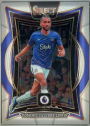 Front of 2024-25 Panini Select Premier League Soccer Dominic Calvert-Lewin #59 Terrace, upright portrait soccer card. The upper portion has a large SELECT logo over a dark panel. Dominic Calvert-Lewin is shown running in an Everton blue…