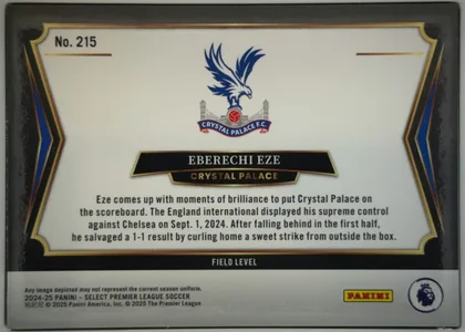 Back of 2024-25 Panini Select Premier League Soccer EBERECHI EZE #215 Field Level, upright landscape back with a black and gold ornamental border and blue side chevrons. The upper-left corner reads "No. 215". A Crystal Palace crest…