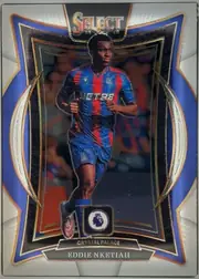 Front of 2024-25 Panini Select Premier League Soccer Eddie Nketiah #76 Base Terrace, portrait soccer card front. A player in a blue-and-red Crystal Palace kit is centered within an ornate reflective black, blue, gold, and white…