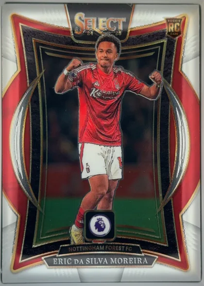 Front of 2024-25 Panini Select Premier League Soccer Eric Da Silva Moreira #73 Terrace, upright portrait soccer card front. The SELECT 24 25 logo is centered at the top, with a ROOKIE RC CARD badge in the upper-right corner. A player in…
