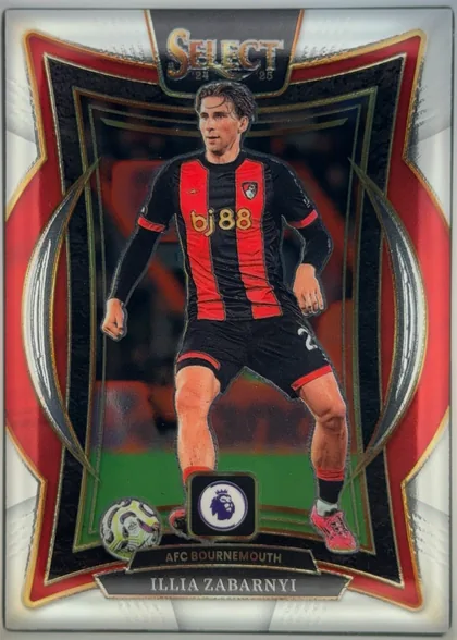Front of 2024-25 Panini Select Premier League Soccer Illia Zabarnyi #62, upright portrait soccer card. A large Select logo is centered at the top with "24 25" beneath it. The player is shown standing in an AFC Bournemouth…