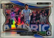 Front of 2024-25 Panini Select Premier League Soccer Kaoru Mitoma #8 Prizm, upright landscape soccer card. A central action photograph shows Kaoru Mitoma in a Brighton & Hove Albion blue-and-white striped kit running on the…