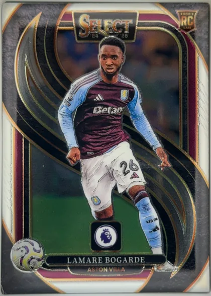 Front of 2024-25 Panini Select Premier League Soccer Lamare Bogarde #112 Mezzanine, portrait-oriented soccer card front featuring Lamarre Bogarde in an Aston Villa kit, centered over a stadium/action background. The top has a large…