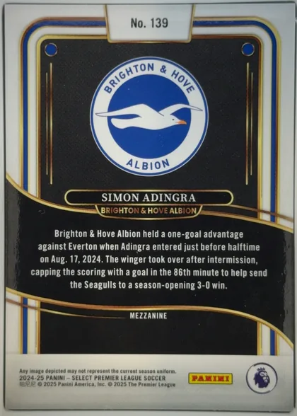 Back of 2024-25 Panini Select Premier League Soccer Simon Adingra #139 Mezzanine, upright portrait-format card back. A white border surrounds a black central field with blue, gold, and brown layered curved accents. The Brighton &…