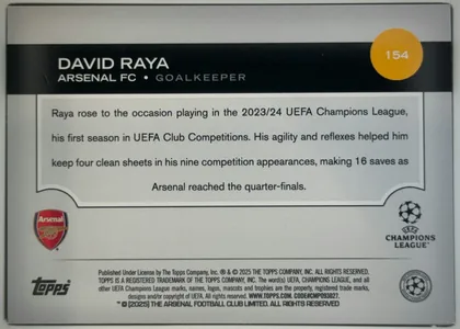 Back of 2024-25 Topps UEFA Club Competitions Soccer David Raya #154 Base, back of a soccer card. A black horizontal band across the upper portion contains the large white name DAVID RAYA, with ARSENAL FC and GOALKEEPER…