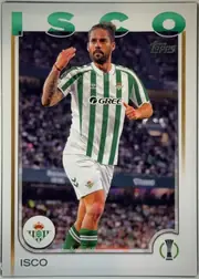 Front of 2024-25 Topps UEFA Club Competitions Soccer Isco #143, front of a soccer card. A white/silver frame surrounds a full-bleed action photograph of Isco wearing the Real Betis green-and-white vertically…