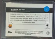 Back of 2024-25 Topps UEFA Club Competitions Soccer Lamine Yamal #27 Base, landscape-oriented player card back. A black header spans the upper portion with large white LAMINE YAMAL lettering, FC BARCELONA and FORWARD…
