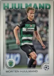 Front of 2024-25 Topps UEFA Club Competitions Soccer MORTEN HJULMAND #175 Base, front of a soccer card. A large metallic-green, white-outlined sans-serif surname 'HJULMAND' spans the top. Below it a full-bleed action photograph…