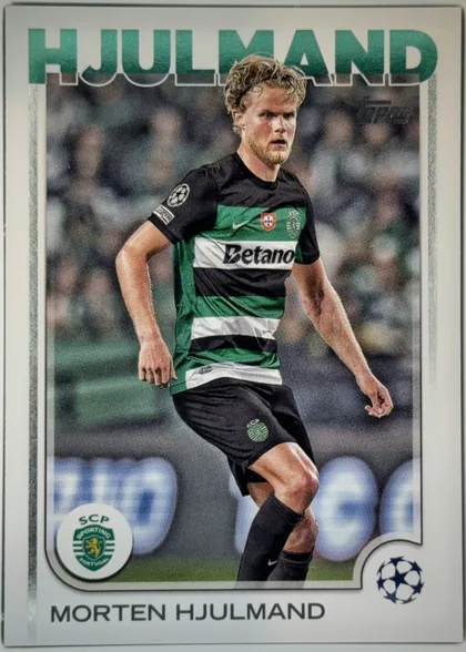 Front of 2024-25 Topps UEFA Club Competitions Soccer MORTEN HJULMAND #175 Base, front of a soccer card. A large metallic-green, white-outlined sans-serif surname 'HJULMAND' spans the top. Below it a full-bleed action photograph…