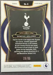 Back of 2024 Panini Select Premier League Dominic Solanke #6 Terrace Prizm /85, serial numbered 28/85, portrait-oriented card back with a white outer margin and ornate navy, black, gold, and white frame. The top has TERRACE, No. 6, and PRIZM. A…