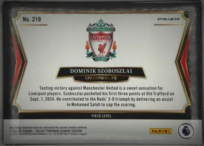 Back of 2024 Panini Select Premier League Dominik Szoboszlai #219 Prizm; Field Level, landscape-oriented soccer card back. A large Liverpool Football Club crest is centered near the top. The card number "No. 219" appears at upper-left…