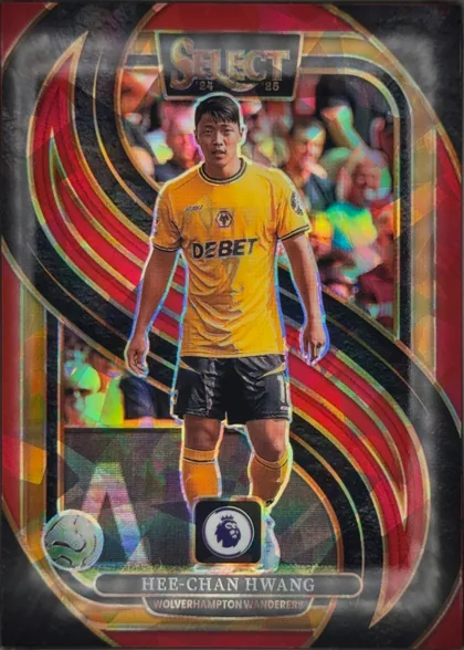 Front of 2024 Panini Select Premier League HEE-CHAN HWANG #130 Mezzanine Prizm, front of a soccer player card. A full-body cutout of an Asian male player stands centered, wearing a gold/yellow Wolverhampton Wanderers away kit…