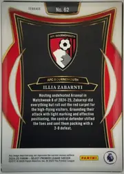 Back of 2024 Panini Select Premier League Illia Zabarnyi #62 Terrace, upright portrait-oriented card back. A white border surrounds a black central field framed by layered red, black, and gold curves and pointed…