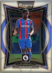 Front of 2024 Panini Select Premier League Marc Guéhi #78 Base Terrace, portrait-oriented soccer card front. A large central image shows a player in a blue-and-red striped Crystal Palace kit on a stadium background. The…