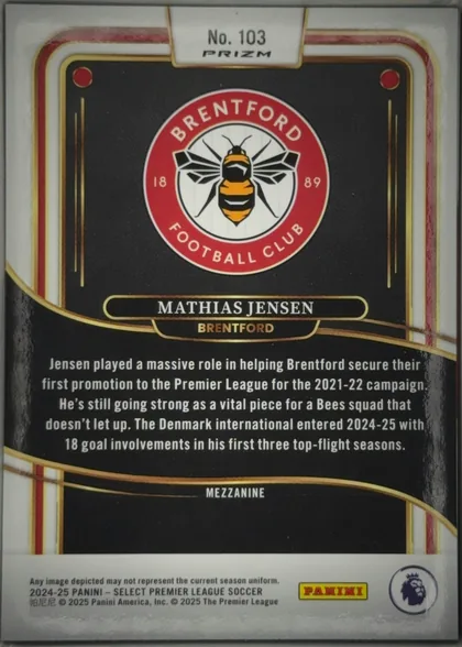 Back of 2024 Panini Select Premier League Mathias Jensen #103 Mezzanine Prizm, landscape-style statistics/biography back presented upright in portrait orientation. A white, red, and gold ornamental border surrounds a black…