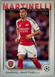 Front of 2024 Topps UEFA Gabriel Martinelli #5 Base, front of a soccer card. Across the top, the surname 'MARTINELLI' is printed in large red capital letters with a white outline. Below it is a…