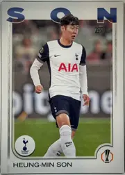Front of 2024 Topps UEFA HEUNG-MIN SON #68, front of a soccer card. A full-length action photo of a player in a white Tottenham Hotspur home kit (white shirt with navy sleeves, red 'AIA'…