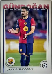 Front of 2024 Topps UEFA İLKAY GÜNDOĞAN #185 Base, portrait soccer card front. Large red uppercase GÜNDOĞAN title spans the top, with the player photograph centered below. The player wears a split…