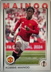 Front of 2024 Topps UEFA KOBBIE MAINOO #29 Base, front of a soccer card. Top border carries the surname 'MAINOO' in large bold red sans-serif capitals. The central action photograph shows a Black…