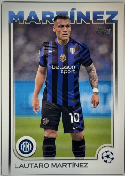 Front of 2024 Topps UEFA Lautaro Martínez #50 Base, portrait soccer card showing Lautaro Martínez in an Inter Milan blue-and-black striped kit, standing on a blurred stadium pitch. The player's…