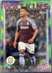 Front of 2024 Topps UEFA Ollie Watkins #33, upright portrait soccer card front. Large red-and-black WATKINS heading spans the top, with a Topps logo at upper right. Full-body image of Ollie…