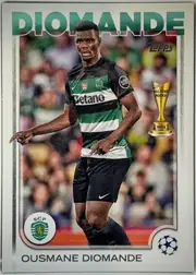 Front of 2024 Topps UEFA OUSMANE DIOMANDE #122, front of a soccer card. A large green sans-serif name 'DIOMANDE' spans the top with a thin white outline. Below it a full-bleed action photo shows a…