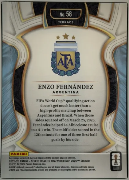 Back of 2025-26 Panini - Select Road to FIFA World Cup 2026 Soccer Enzo Fernández #58 Base Terrace, back of a soccer trading card. An ornate white, light-gray, gold, dark-blue, and black symmetrical border surrounds a cream central panel. At the…