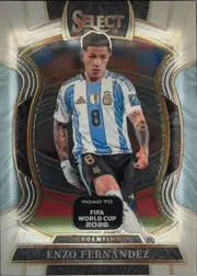 Front of 2025-26 Panini - Select Road to FIFA World Cup 2026 Soccer Enzo Fernández #58 Base Terrace, upright portrait soccer player front. Top center shows a large metallic 'SELECT' logo over '25' and '26'. The dominant image is an Argentina player…