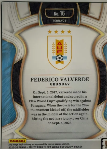 Back of 2025-26 Panini - Select Road to FIFA World Cup 2026 Soccer Federico Valverde #16 Terrace, upright portrait-format card back with an ornate white, gold, bronze, black, and blue frame. A black-and-gold plaque at the top shows "No. 16" and…